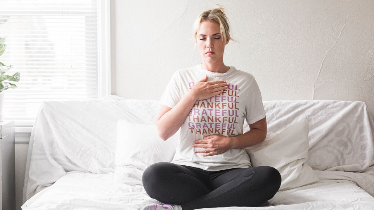 Woman meditating on gratitude